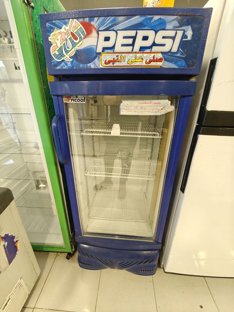 تلاجه عرض كولا. الاصلي