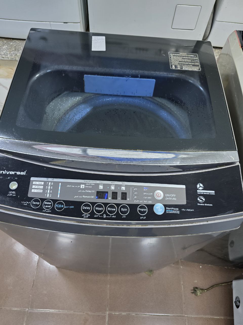 غساله يونيفرسال فوق اتوماتك 12 كيلو مستعمله بحاله ممتازه كود 5437