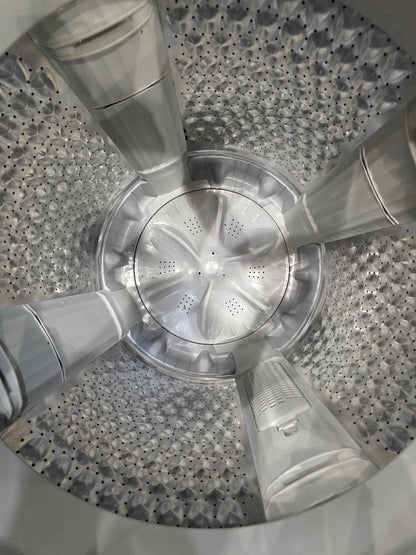 غساله زانوسي فوق اتوماتيك 12 كيلو كسر زيرو  حاله ممتازه كود 5073