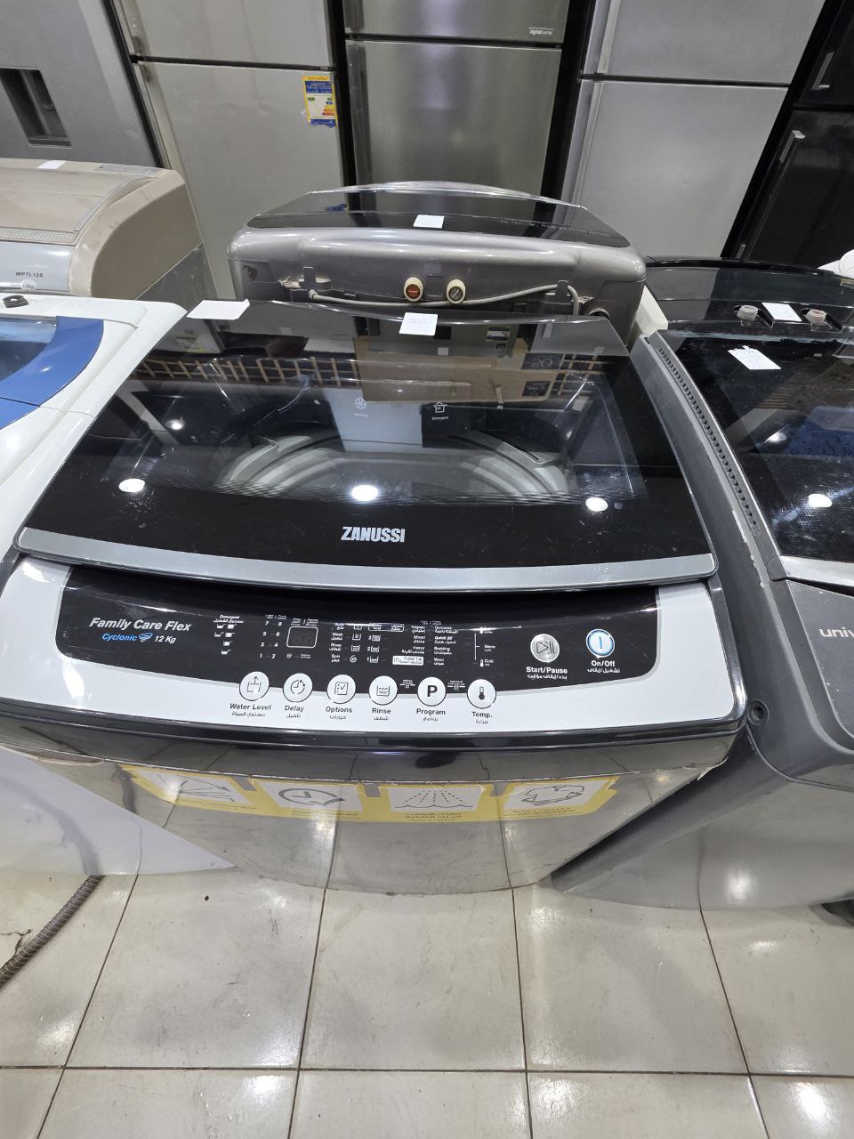 غساله زانوسي فوق اتوماتيك 12 كيلو كسر زيرو  حاله ممتازه كود 5073