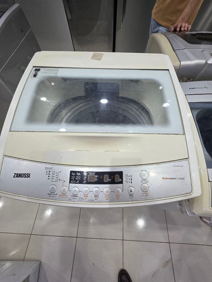 غساله زانوسي فوق اتوماتيك 12 كيلو مستعمله بحاله جيده