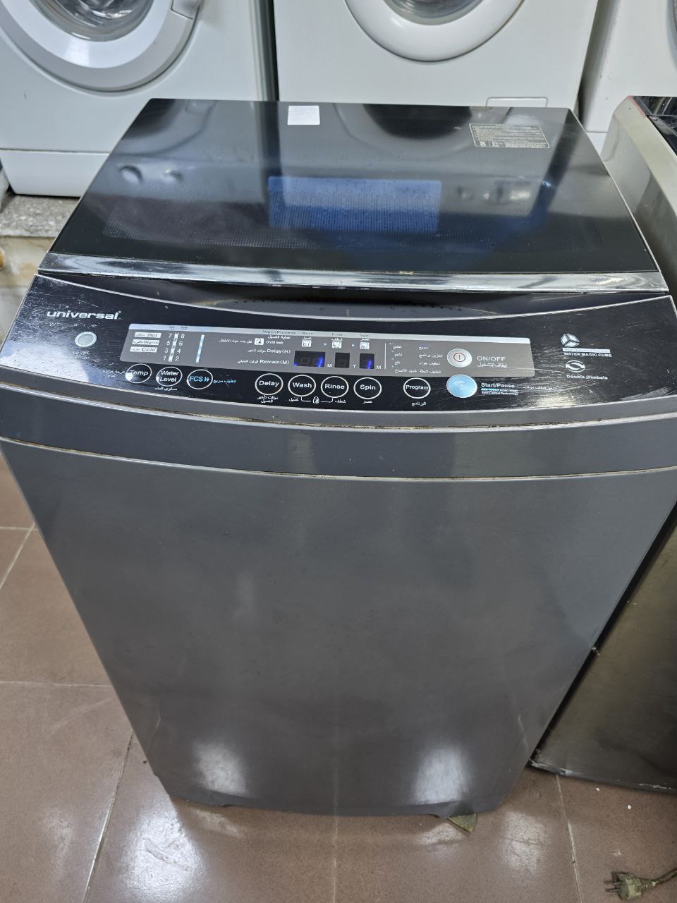 غساله يونيفرسال فوق اتوماتك 12 كيلو مستعمله بحاله ممتازه كود 5437